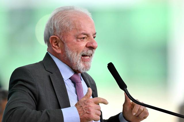 Brazil's President Luiz Inacio Lula da Silva delivers a speech during the launch of a home renovation program for low-income families at Planalto Palace in Brasilia on October 20, 2025. (Photo by Evaristo Sa / AFP)