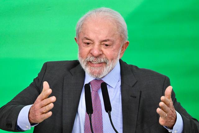 Brazil's President Luiz Inacio Lula da Silva delivers a speech during the launch of a home renovation program for low-income families at Planalto Palace in Brasilia on October 20, 2025. (Photo by Evaristo Sa / AFP)