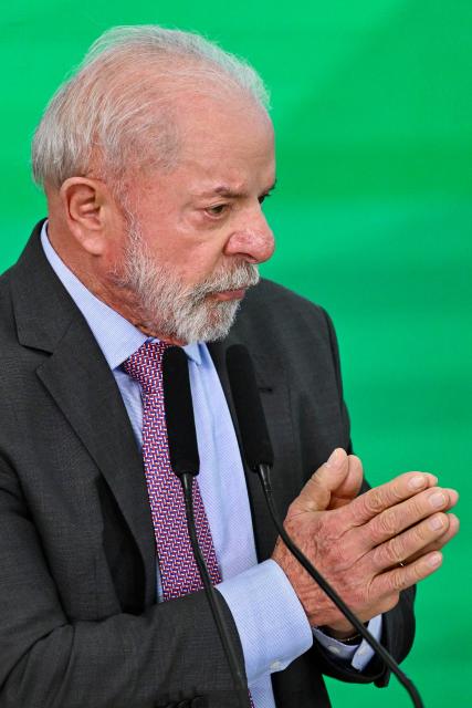 Brazil's President Luiz Inacio Lula da Silva delivers a speech during the launch of a home renovation program for low-income families at Planalto Palace in Brasilia on October 20, 2025. (Photo by Evaristo Sa / AFP)