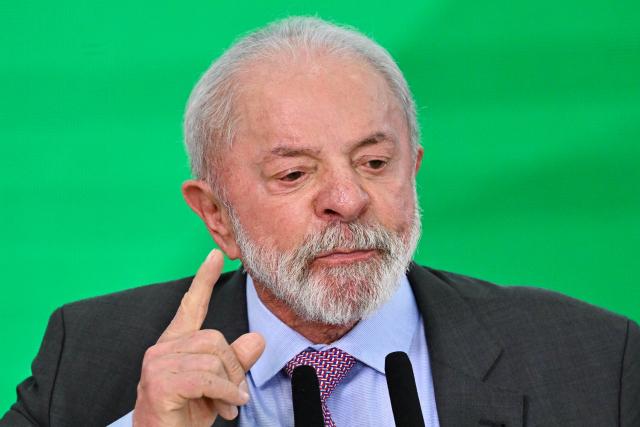 Brazil's President Luiz Inacio Lula da Silva delivers a speech during the launch of a home renovation program for low-income families at Planalto Palace in Brasilia on October 20, 2025. (Photo by Evaristo Sa / AFP)