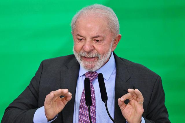 Brazil's President Luiz Inacio Lula da Silva delivers a speech during the launch of a home renovation program for low-income families at Planalto Palace in Brasilia on October 20, 2025. (Photo by Evaristo Sa / AFP)