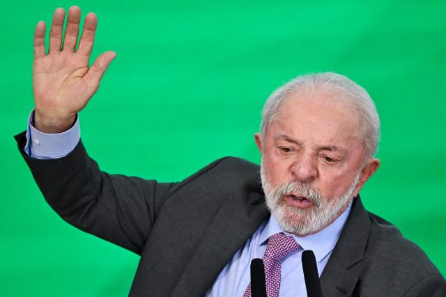 Brazil's President Luiz Inacio Lula da Silva delivers a speech during the launch of a home renovation program for low-income families at Planalto Palace in Brasilia on October 20, 2025. (Photo by Evaristo Sa / AFP)
