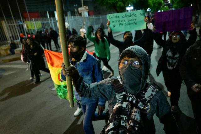 Demonstrators protest against president-elect Rodrigo Paz following the results of the run-off presidential election in La Paz on October 20, 2025. Paz, a 58-year-old economist, won Sunday's election with 54.5% of the counted votes, ahead of right-wing former president Jorge Quiroga, who received 45.4%, according to the official tally. He is set to take office on November 8. (Photo by MARTIN BERNETTI / AFP)