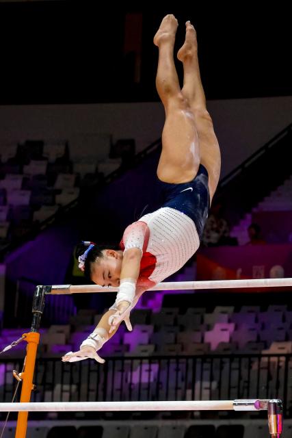 USA's Leanne Wong competes on the uneven bars during the women's qualifying session at the 53rd FIG Artistic Gymnastics World Championships in Jakarta on October 21, 2025. (Photo by BAY ISMOYO / AFP)