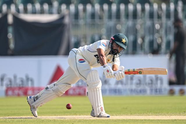 Pakistan's Saud Shakeel plays a shot during the second day of the second Test cricket match between Pakistan and South Africa at the Rawalpindi Cricket Stadium in Rawalpindi on October 21, 2025. (Photo by Aamir QURESHI / AFP)