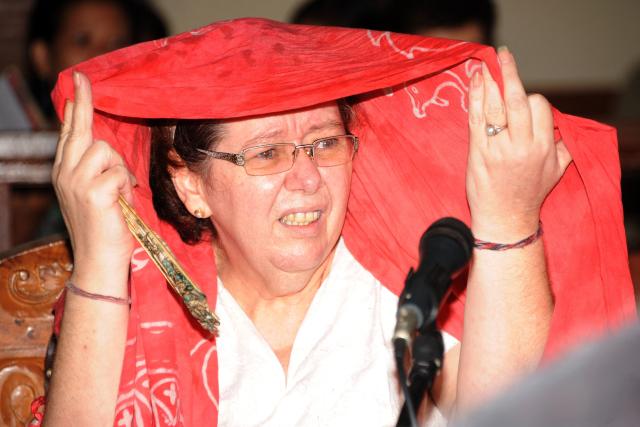 (FILES) British national Lindsay Sandiford, who was later sentenced to death in 2013 on the island of Bali after she was convicted of trafficking drugs worth an estimated 2.14 million USD, attends a hearing at a court in Denpasar, Indonesia's Bali island, on September 27, 2012. Indonesia will sign an agreement on October 21, 2025 to repatriate two British nationals, including Sandiford - a grandmother, languishing on death row for drug-related crimes, an Indonesian government source told AFP. (Photo by SONNY TUMBELAKA / AFP)