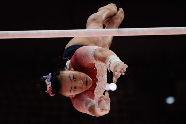 USA's Leanne Wong competes on the uneven bars during the women's qualifying session at the 53rd FIG Artistic Gymnastics World Championships in Jakarta on October 21, 2025. (Photo by Yasuyoshi CHIBA / AFP)