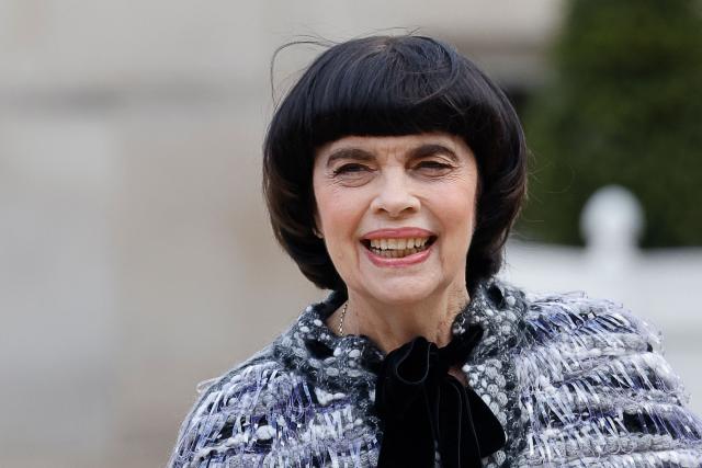 (FILES) French singer Mireille Mathieu arrives to attend an official state dinner as part of the Chinese president's two-day state visit to France, at the Elysee Palace in Paris, on May 6, 2024. At 79 years old, with 1,200 songs in twelve languages and 3,000 concerts around the world, Mireille Mathieu is launching a tour celebrating her sixty-year career from 24 to 26 October at L'Olympia in Paris. (Photo by Ludovic MARIN / AFP)