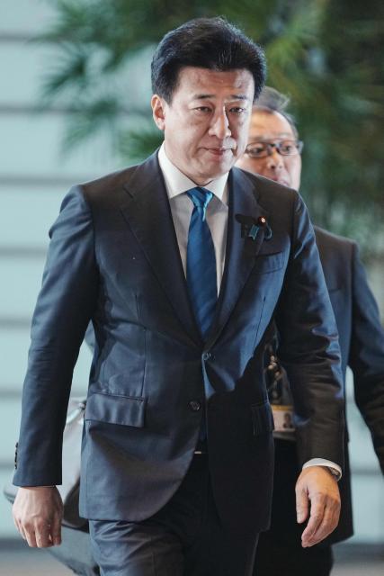 Japan's newly appointed chief cabinet secretary Minoru Kihara arrives at the prime minister's office in Tokyo on October 21, 2025. (Photo by Kazuhiro NOGI / AFP)