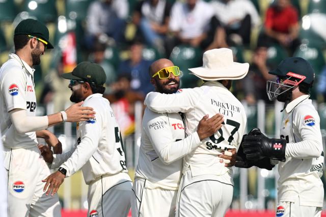 Pakistan's Sajid Khan (C) celebrates with teammates after taking the wicket of South Africa's captain Aiden Markram during the second day of the second Test cricket match between Pakistan and South Africa at the Rawalpindi Cricket Stadium in Rawalpindi on October 21, 2025. (Photo by Aamir QURESHI / AFP)