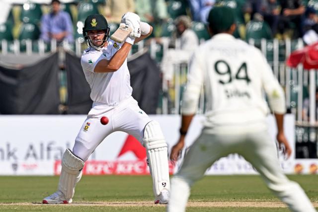 South Africa's Tristan Stubbs plays a shot during the second day of the second Test cricket match between Pakistan and South Africa at the Rawalpindi Cricket Stadium in Rawalpindi on October 21, 2025. (Photo by Aamir QURESHI / AFP)