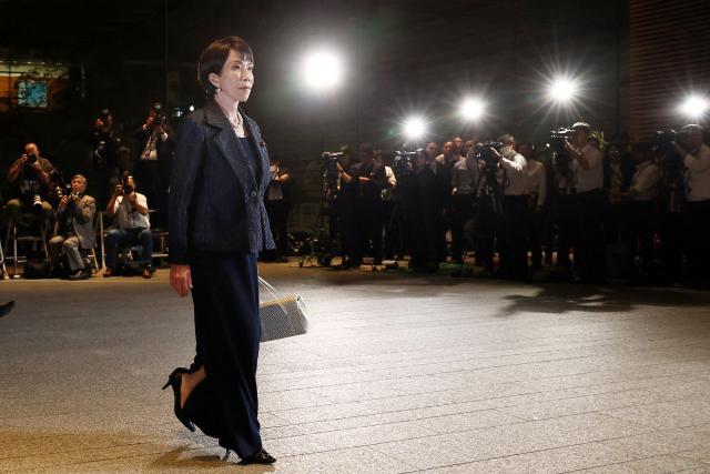 Ruling Liberal Democratic Party (LDP) President and Japan's newly appointed Prime Minister Sanae Takaichi leaves the prime minister's office for the investiture ceremony at the Imperial Palace in Tokyo on October 21, 2025. (Photo by JIJI Press / AFP) / Japan OUT