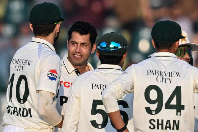 Pakistan's Asif Afridi (2L) celebrates with teammates after taking the wicket of South Africa's Tony de Zorzi during the second day of the second Test cricket match between Pakistan and South Africa at the Rawalpindi Cricket Stadium in Rawalpindi on October 21, 2025. (Photo by Aamir QURESHI / AFP)