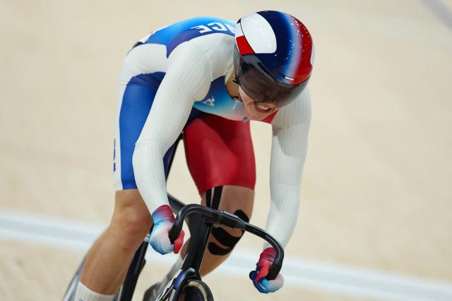 (FILES) France's Mathilde Gros competes in a women's track cycling sprint qualifying round of the Paris 2024 Olympic Games at the Saint-Quentin-en-Yvelines National Velodrome in Montigny-le-Bretonneux, south-west of Paris, on August 9, 2024. After spending time in New Zealand and leaving France to set up her own business, Mathilde Gros has put the disappointment of the 2024 Olympics behind her and is making a fresh start at the Santiago velodrome during the Track Cycling World Championships. (Photo by Thomas SAMSON / AFP)