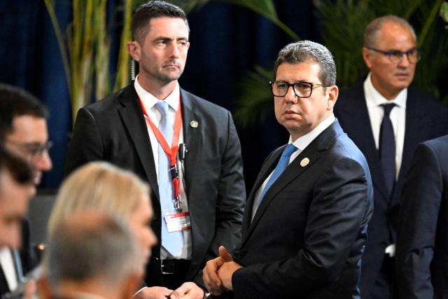 Egypt's intelligence head Hassan Rashad (2nd R) is pictured on the sidelines of a summit meeting on Gaza in the Red Sea resort of Sharm el-Sheikh on October 13, 2025. Rashad met Israel's Prime Minister Benjamin Netanyahu in Jerusalem on October 21 for talks aimed at reinforcing a fragile US-backed ceasefire in Gaza. Rashad's trip to Jerusalem comes more than a week into a fragile truce between Israel and Hamas, under a deal brokered in the Egyptian Red Sea resort town of Sharm El-Sheikh. (Photo by Khaled DESOUKI / AFP)