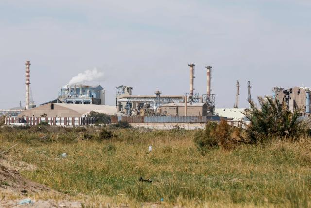 This photograph shows sections of a state-run phosphate processing plant in the southern city of Gabes on October 21, 2025. Workers in Gabes launched a general strike on October 21 following weeks of protest over the chemical factory residents blame for a spike in serious health issues. (Photo by Mohamed KHALIL / AFP)