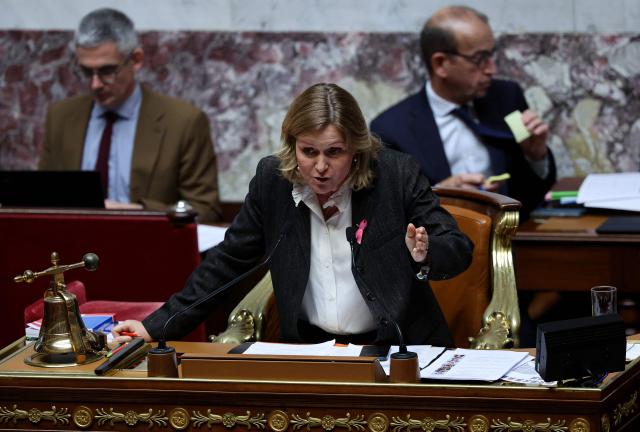 President of the French National Assembly Yael Braun-Pivet speaks during a session of questions to the government at The National Assembly, France's lower house parliament, in Paris, on October 21, 2025. (Photo by Anne-Christine POUJOULAT / AFP)
