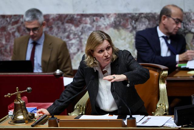 President of the French National Assembly Yael Braun-Pivet speaks during a session of questions to the government at The National Assembly, France's lower house parliament, in Paris, on October 21, 2025. (Photo by Anne-Christine POUJOULAT / AFP)