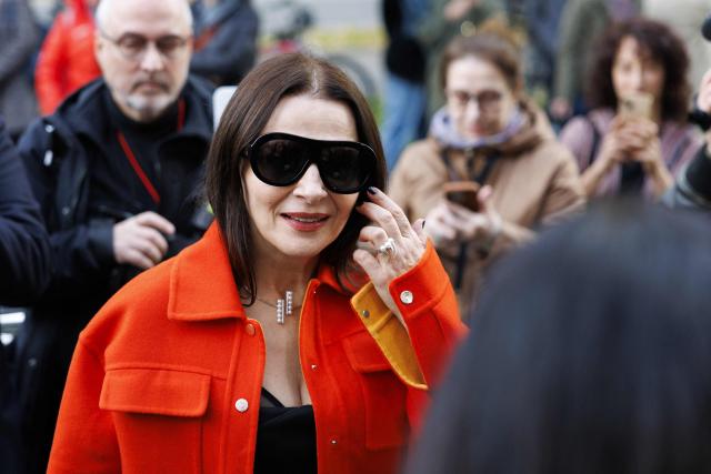 French actress Juliette Binoche arrives for the premiere of the film 'In-I in Motion' at the Gartenbaukino cinema in Vienna on October 21, 2025, as part of the 63rd edition of the Viennale, the Vienna International Film Festival, which runs until October 28. 'In-I In Motion' is Binoche's directorial debut. (Photo by TOBIAS STEINMAURER / APA / AFP) / Austria OUT