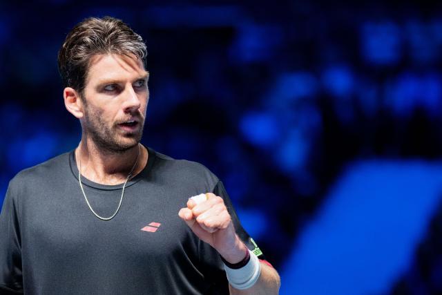 Britain's Cameron Norrie reacts after winning a point as he plays against Russia's Andrey Rublev during their men's round of 16 singles match of the ATP Vienna Open tennis tournament in Vienna on October 21, 2025. (Photo by GEORG HOCHMUTH / APA / AFP) / Austria OUT
