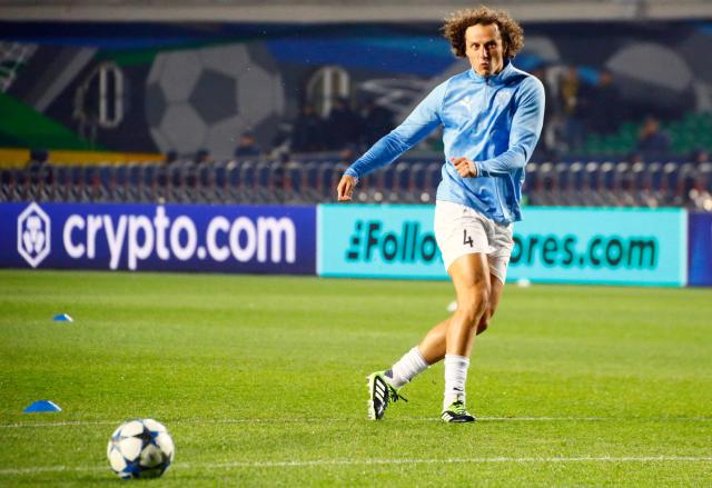 Pafos FC's Brazilian defender David Luiz warms up prior to the UEFA Champions League football match between Kairat Almaty and Pafos at the Almaty Ortalyk stadion in Almaty on October 21, 2025. (Photo by Ruslan PRYANIKOV / AFP)