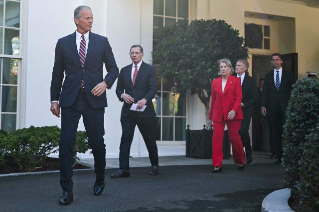 (L/R) US Senate Majority Leader John Thune (R-SD), Senator John Barrasso (R-WY), Senator Shelley Moore Capito (R-WV), Senator James Lankford (R-OK) and US Senator Tom Cotton (R-AR) exit the West Wing and arrive to speak to the media following a Rose Garden lunch with US President Trump at the White House in Washington, DC on October 21, 2025. (Photo by ANDREW CABALLERO-REYNOLDS / AFP)