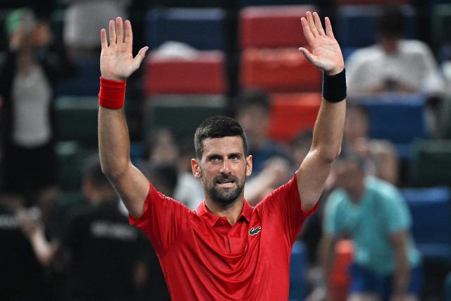 TOPSHOT - (FILES) Serbia's Novak Djokovic reacts after winning against Croatia's Marin Cilic in their men's singles match at the Shanghai Masters tennis tournament in Shanghai on October 3, 2025. Tennisman Novak Djokovic has announced his withdrawal from the Paris Masters 1000 on Instagram on October 21, 2025. (Photo by Jade GAO / AFP)