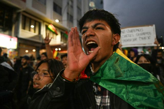 A supporter of Bolivia's former president and presidential candidate for the Freedom and Democracy (Libre) alliance, Jorge "Tuto" Quiroga, shouts slogans during a protest demanding a vote audit by the Supreme Electoral Tribunal (TSE) following the presidential election, in La Paz on October 21, 2025. Rodrigo Paz, a 58-year-old economist, won the second round of voting on October 19 with 54.5 percent of the votes against former right-wing president Jorge Quiroga. (Photo by AIZAR RALDES / AFP)