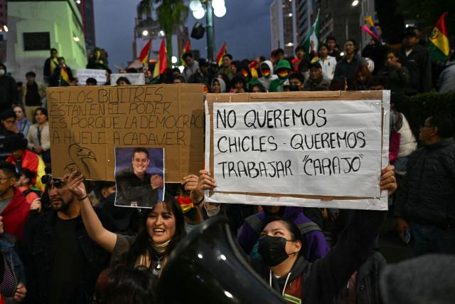Supporters of Bolivia's former president and presidential candidate for the Freedom and Democracy (Libre) alliance, Jorge "Tuto" Quiroga, take part in a protest demanding a vote audit by the Supreme Electoral Tribunal (TSE) following the presidential election, in La Paz on October 21, 2025. Rodrigo Paz, a 58-year-old economist, won the second round of voting on October 19 with 54.5 percent of the votes against former right-wing president Jorge Quiroga. (Photo by AIZAR RALDES / AFP)