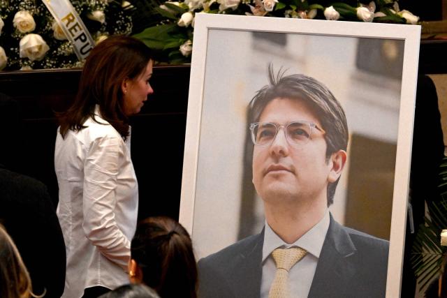 (FILES) Maria Claudia Tarazona, the widow of late Colombian presidential candidate Miguel Uribe, attends his lying in state ceremony at Congress in Bogota on August 11, 2025. One of the individuals involved in the shooting death of Colombian presidential candidate Miguel Uribe — who died in August after several weeks in critical condition — was sentenced to 21 years in prison, Colombia's prosecutor's office announced on October 21, 2025. (Photo by Raul ARBOLEDA / AFP)