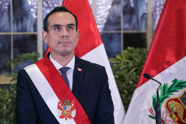 (FILES) Peru's interim President Jose Jeri looks on during the inauguration ceremony of his cabinet at the Presidential Palace in Lima on October 13, 2025. Peru's interim government declared a state of emergency on October 21, 2025, in Lima and the neighboring port of Callao in an effort to curb a wave of violence and extortion blamed on organized crime. (Photo by CONNIE FRANCE / AFP)