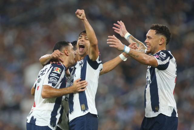 Monterrey's Argentine forward #07 German Berterame (L) celebrates after scoring his team's third goal during the Liga MX Apertura football match between Monterrey and Juarez at the BBVA Stadium in Monterrey, Mexico, on October 21, 2025. (Photo by Julio Cesar AGUILAR / AFP)