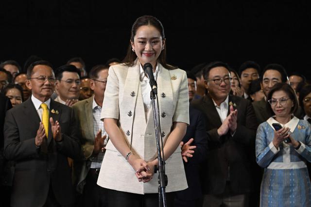 (FILES) Thailand's new Prime Minister Paetongtarn Shinawatra, known by her nickname "Ung Ing" and daughter of former prime minister Thaksin Shinawatra, takes part in a press conference in Bangkok on August 16, 2024. Thailand's recently removed prime minister Paetongtarn Shinawatra resigned on October 22, 2025 as leader of the party founded by her father, ex-premier Thaksin, signaling the potential end of the family's decades-long political dynasty. (Photo by Lillian SUWANRUMPHA / AFP)