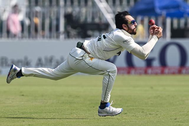 Pakistan's Salman Agha drops a catch of South Africa's Senuran Muthusamy during the third day of the second Test cricket match between Pakistan and South Africa at the Rawalpindi Cricket Stadium in Rawalpindi on October 22, 2025. (Photo by Aamir QURESHI / AFP)