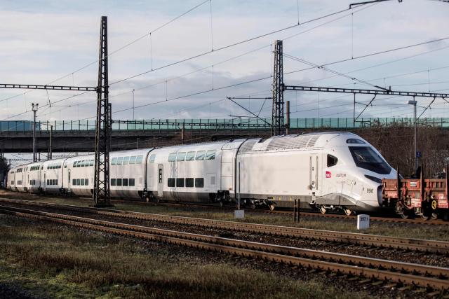 (FILES) A photo taken on December 7, 2022 shows a new TGV M train, also known as Avelia Horizon, arriving at the Bechovice train station in Prague, on its way to the VUZ Velim test centre. Eurostar said on October 22, 2025 it will run double-decker trains through the Channel Tunnel for the first time, as it faces potential competition on its routes between London and mainland Europe. A 2.0-billion euro ($2.3-billion) investment in up to 50 electric double-decker trains built by French group Alstom, with it's Avelia Horizon train, could help Eurostar reach 30 million annual passengers by the new decade, up around 50 percent from current traveller numbers. (Photo by Michal Cizek / AFP)