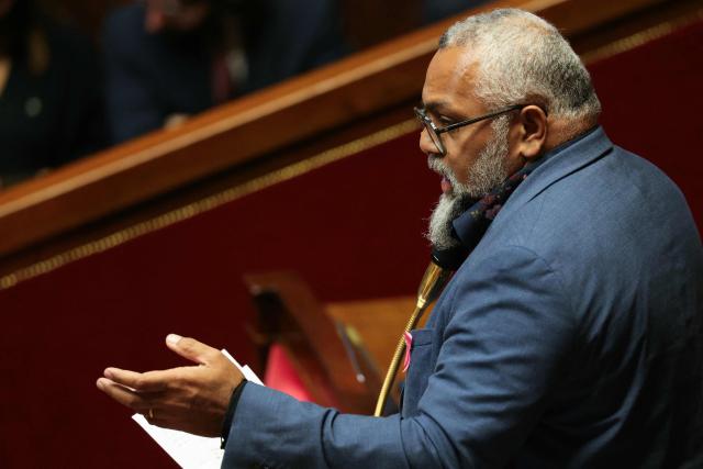 Democrate et Republicaine's MP Emmanuel Tjibaou speaks during a session on the postponement of the general renewal of the Congress and Provincial Assemblies of New Caledonia at The National Assembly, France's lower house parliament, in Paris, on October 22, 2025. (Photo by Alain JOCARD / AFP)