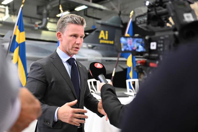 Sweden's Defense Minister Paal Jonson answers journalists after a joint press conference of the Swedish Prime Minister and the Ukrainian President in Linkoping, Sweden, on October 22, 2025. Sweden and Ukraine signed a letter of intent to supply up to 150 Gripen fighter jets by Swedish manufacturer Saab. (Photo by Jonathan Nackstrand / AFP)