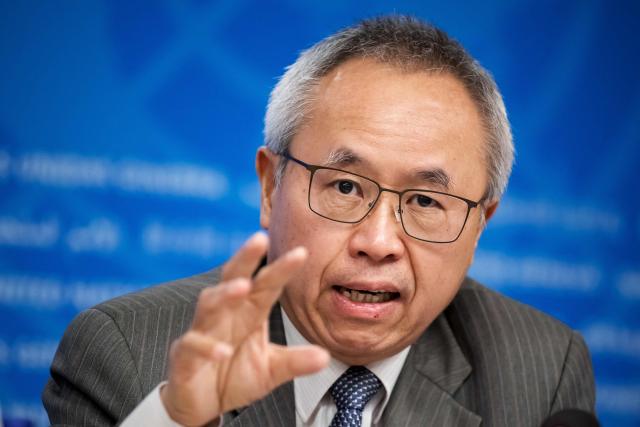 United Nations under-secretary-general and UNOC's general secretary Li Junhua speaks during a press conference, part of the 16th United Nations Trade and Development (UNCTAD) ministerial conference, in Geneva on October 22, 2025. (Photo by Fabrice COFFRINI / AFP)