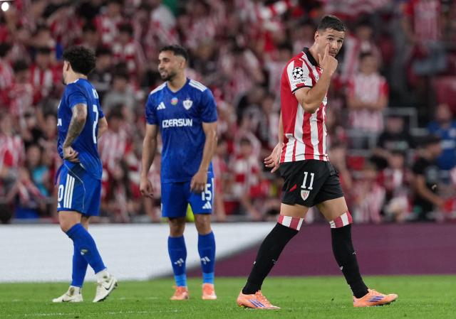 Athletic Bilbao's Spanish forward #11 Gorka Guruzeta gestures after scoring his team's first goal during the UEFA Champions League league phase day 3 football match between Athletic Club Bilbao and Qarabagh at San Mames Stadium in Bilbao on October 22, 2025. (Photo by Cesar MANSO / AFP)