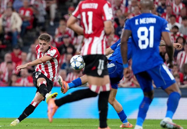 Athletic Bilbao's Spanish forward #23 Robert Navarro scores his team's second goal during the UEFA Champions League league phase day 3 football match between Athletic Club Bilbao and Qarabagh at San Mames Stadium in Bilbao on October 22, 2025. (Photo by Cesar MANSO / AFP)