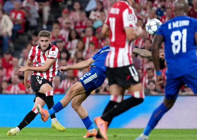 Athletic Bilbao's Spanish forward #23 Robert Navarro scores his team's second goal during the UEFA Champions League league phase day 3 football match between Athletic Club Bilbao and Qarabagh at San Mames Stadium in Bilbao on October 22, 2025. (Photo by Cesar MANSO / AFP)