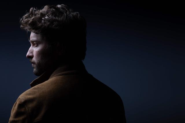 French journalist and writer Paul Gasnier poses during a photo session in Paris on October 22, 2025. (Photo by JOEL SAGET / AFP)