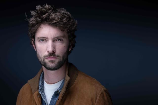 French journalist and writer Paul Gasnier poses during a photo session in Paris on October 22, 2025. (Photo by JOEL SAGET / AFP)