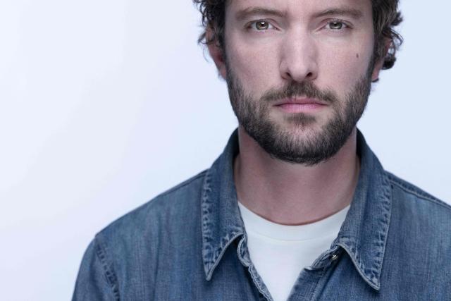 French journalist and writer Paul Gasnier poses during a photo session in Paris on October 22, 2025. (Photo by JOEL SAGET / AFP)
