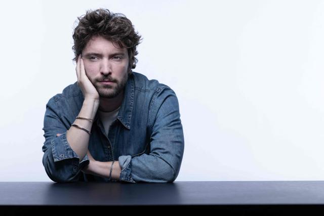 French journalist and writer Paul Gasnier poses during a photo session in Paris on October 22, 2025. (Photo by JOEL SAGET / AFP)