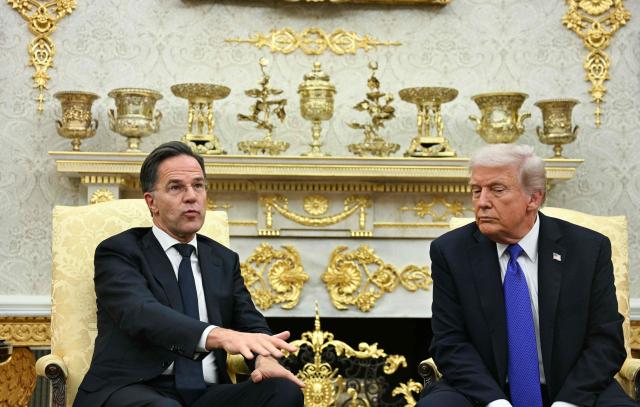 US President Donald Trump meets with NATO Secretary General Mark Rutte in the Oval Office of the White House in Washington, DC, on October 22, 2025. (Photo by Jim WATSON / AFP)