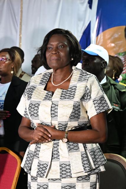 Former Ivorian First Lady and presidential candidate for the Movement of the Capable Generations (MGC), Simone Ehivet Gbagbo, looks on during her campaign rally at Le Barron, in the working-class commune of Yopougon in Abidjan on October 22, 2025. The presidential election is scheduled for October 25, 2025. (Photo by Sia KAMBOU / AFP)