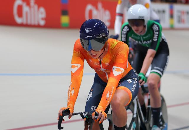 Netherlands' #34 Lorena Wiebes (L) is pictured after winning the women's scratch 10km final during the 2025 UCI Track World Championships at the Peñalolen Velodrome, in Santiago, on October 22, 2025. (Photo by Javier TORRES / AFP)