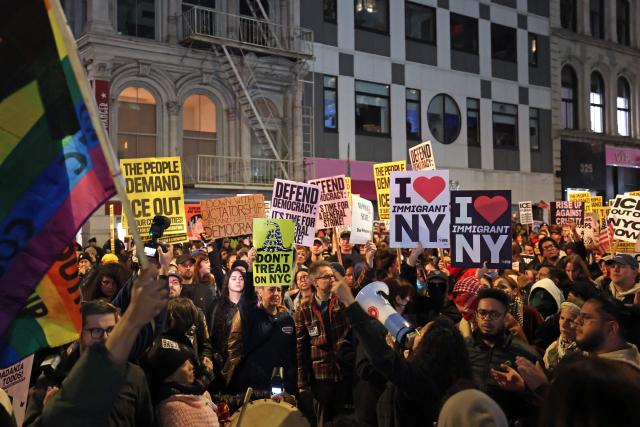 People demonstrate against Immigration and Customs Enforcement (ICE) in New York on October 22, 2025. US President Donald Trump has made deporting undocumented immigrants a key priority for his second term, after successfully campaigning against an alleged "invasion" by criminals. (Photo by TIMOTHY A. CLARY / AFP)