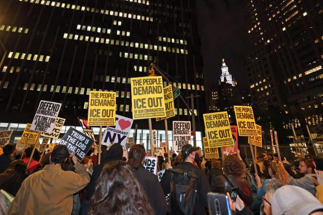 People demonstrate against Immigration and Customs Enforcement (ICE) in New York on October 22, 2025. US President Donald Trump has made deporting undocumented immigrants a key priority for his second term, after successfully campaigning against an alleged "invasion" by criminals. (Photo by TIMOTHY A. CLARY / AFP)